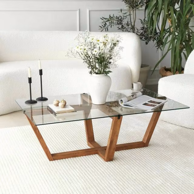 Tavolino da salotto moderno DMORA con piano in vetro trasparente e struttura a X, forma rettangolare, marrone, L: 105 cm, P: 65 cm, H: 35 cm