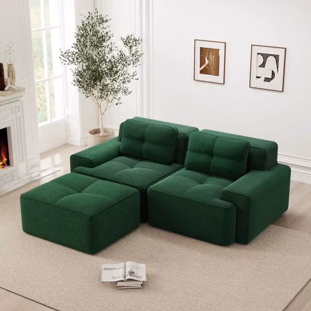 Divano modulare a L con seduta profonda e design senza braccioli in velluto a coste con pouf per salotto verde