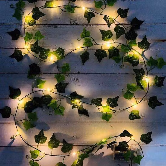 Ghirlanda luminosa a LED gialli alimentata a batteria, ideale per decorazioni domestiche e matrimoni.