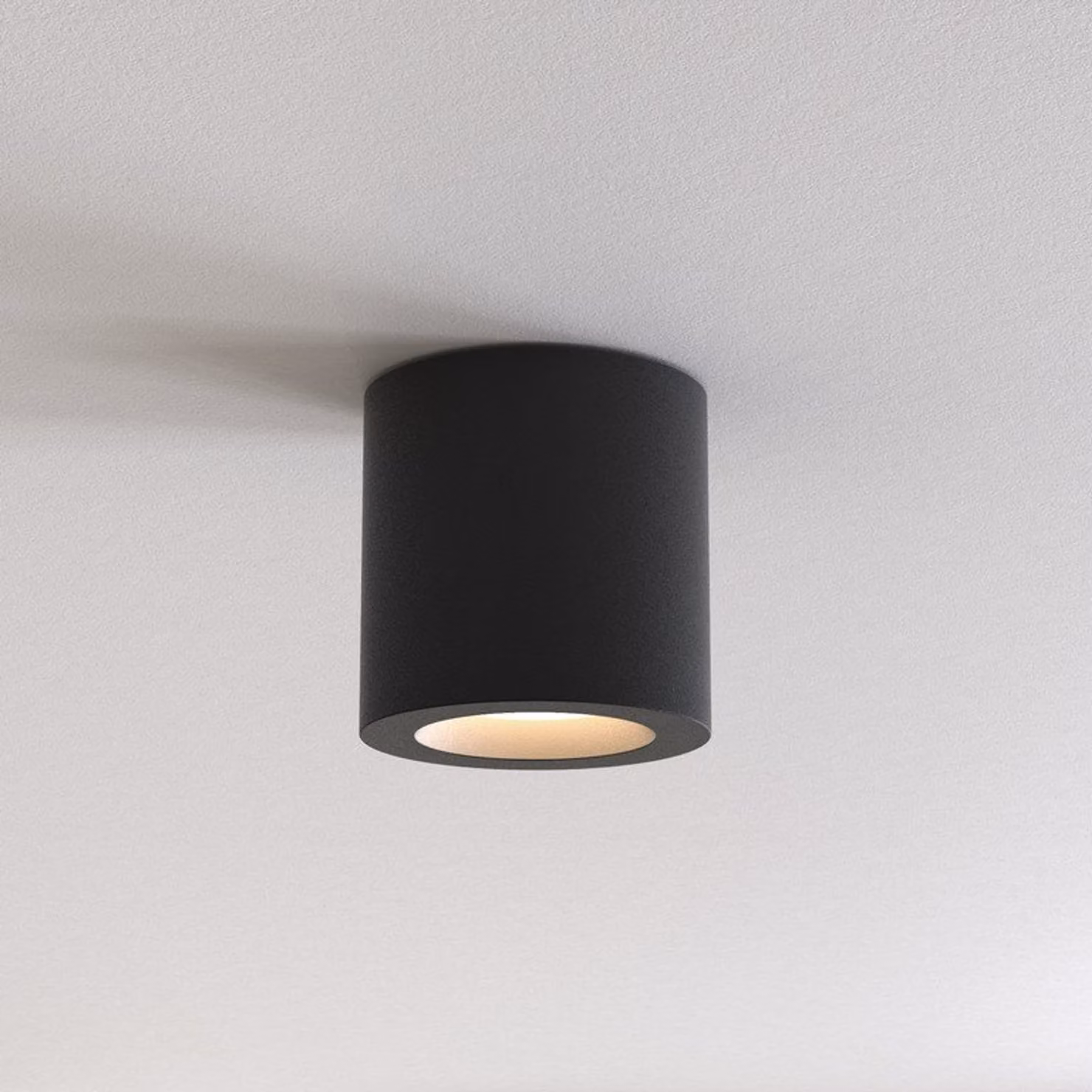 Astro Kos - Downlight rotondo per montaggio a superficie Strutturato nero IP65, GU10