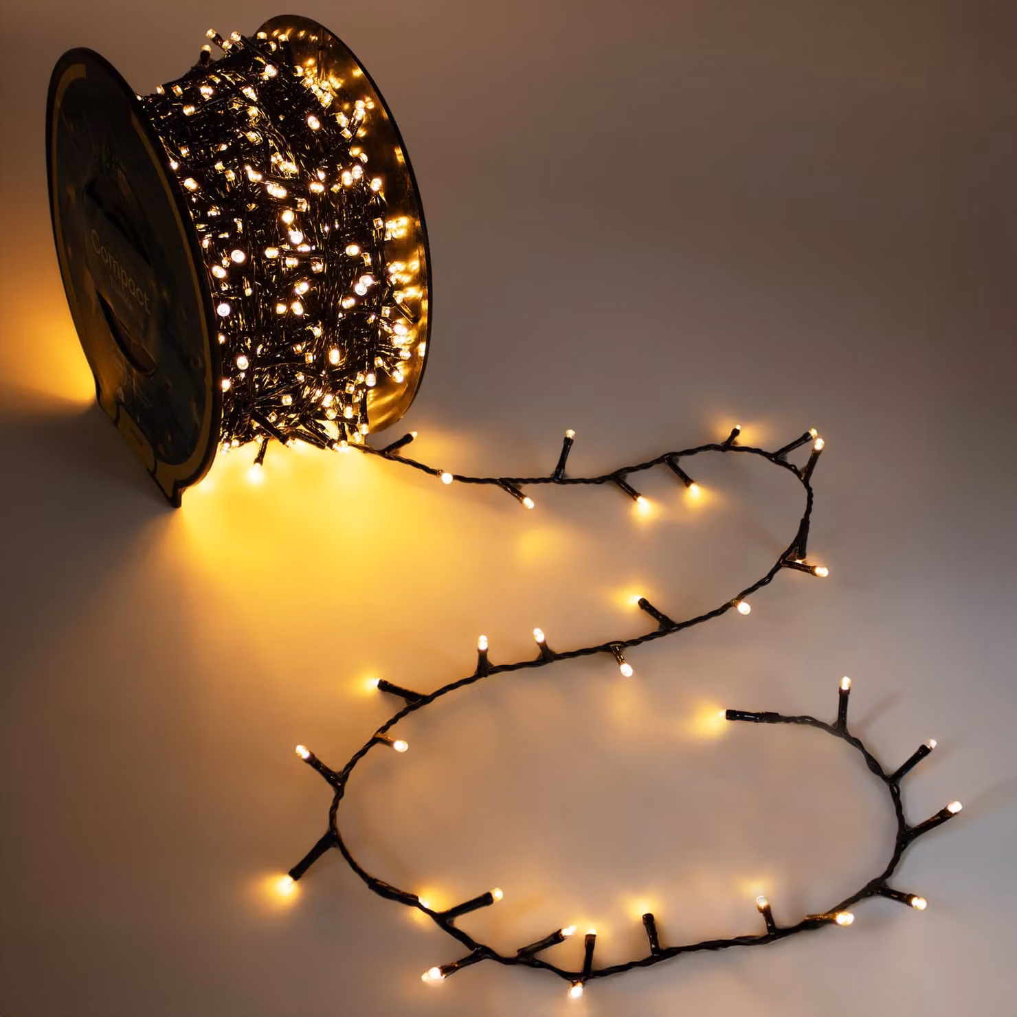 Fiaccole da esterno su tamburo oro soft 22 m con spina - 750 LED - Fiaccole natalizie con doppio timer e 8 funzioni