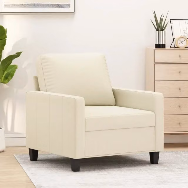 Poltrona moderna in similpelle beige con braccioli e struttura in metallo per soggiorno