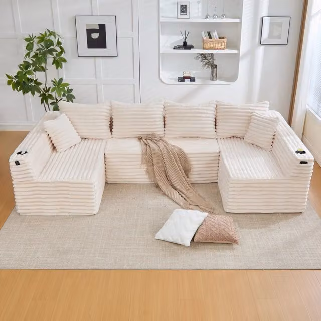 Divano modulare a U OKWISH in tessuto cord beige con portabicchieri, tasca laterale e cuscini, L: 320 cm, P: 155 cm, H: 88 cm