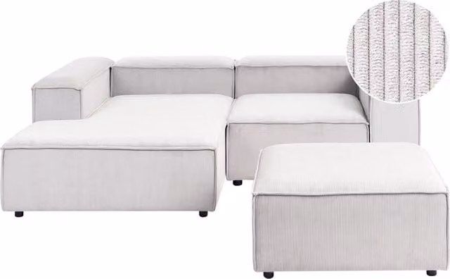 Divano angolare modulare Beliani in velluto a coste bianco sporco con pouf, modello moderno a 3 posti lato destro, L/P/H: 240 x 180 x 110 cm