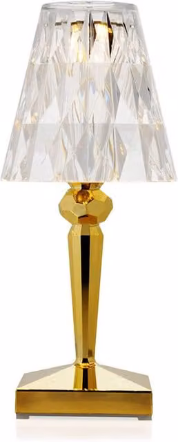 Lampada da tavolo ricaricabile Kartell Battery Metal con luce LED calda in finitura cromo o oro/ottone