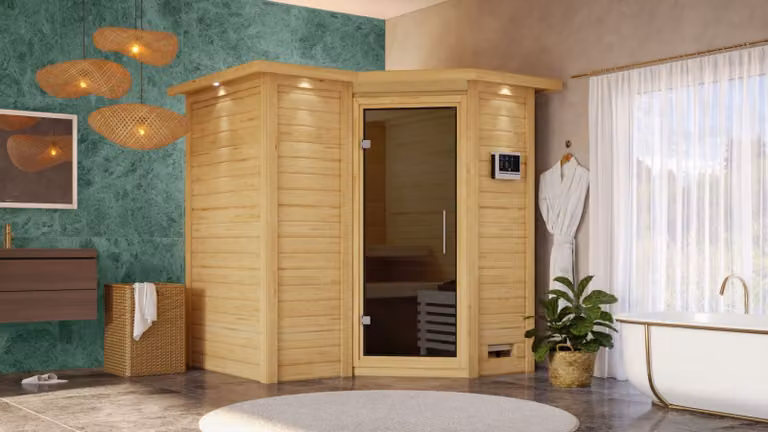 Sauna Sahib 1: con cornice luminosa sul soffitto: 9 kW, stufa finlandese + centralina Easy Finn. Stufa finlandese: 9 kW + centralina Easy Finn. Porta della sauna: porta in vetro intero color grafite. Cornice luminosa sul soffitto
