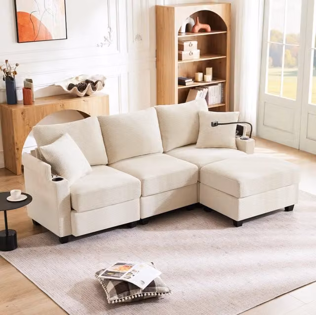 Divano angolare modulare 3-4 posti in velluto a coste beige con pouf; USB e 2 cuscini HOMVRA