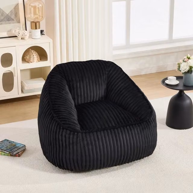 Pouf Mivray in velluto a coste nero per soggiorno e camera da letto