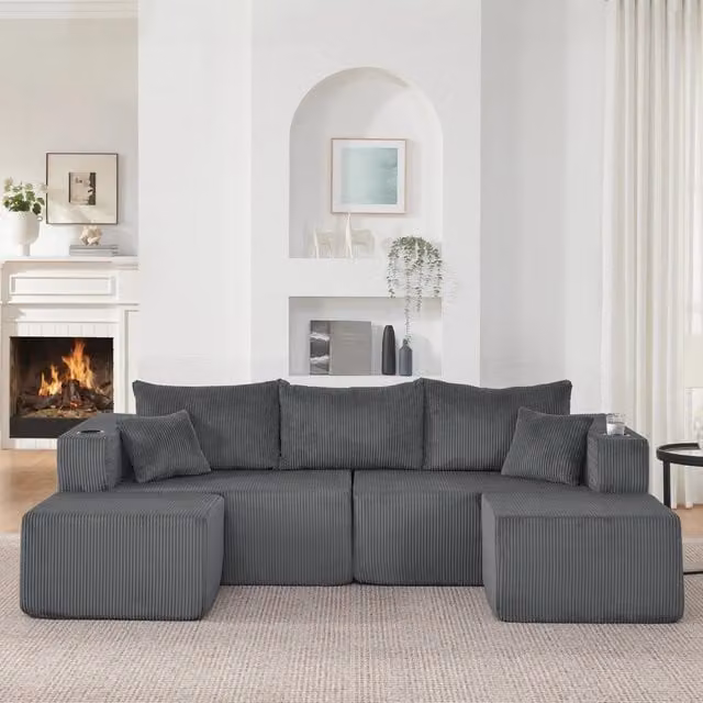 Divano angolare modulare 3 posti con pouf mobili, portabicchieri e tasche laterali in velluto a coste grigio