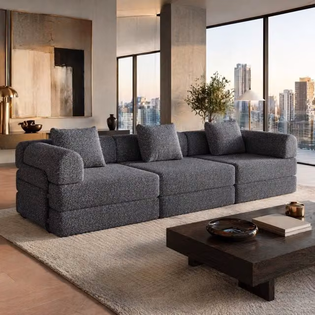 Divano letto 2 in 1 grigio in ciniglia con vano portaoggetti nel bracciolo