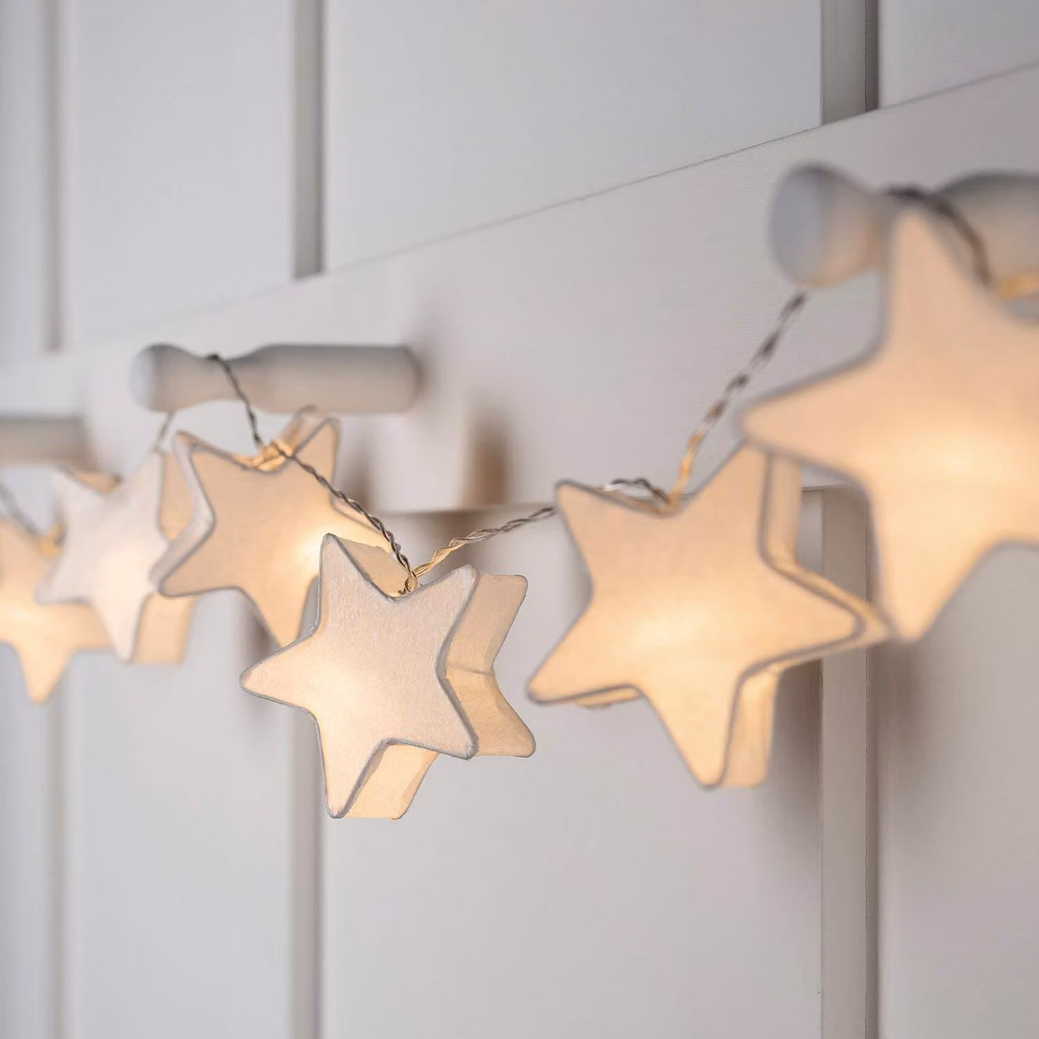 Catena luminosa con 10 stelle a forma di fiore realizzate in carta LED, luce bianco caldo, lunghezza 1,65 metri