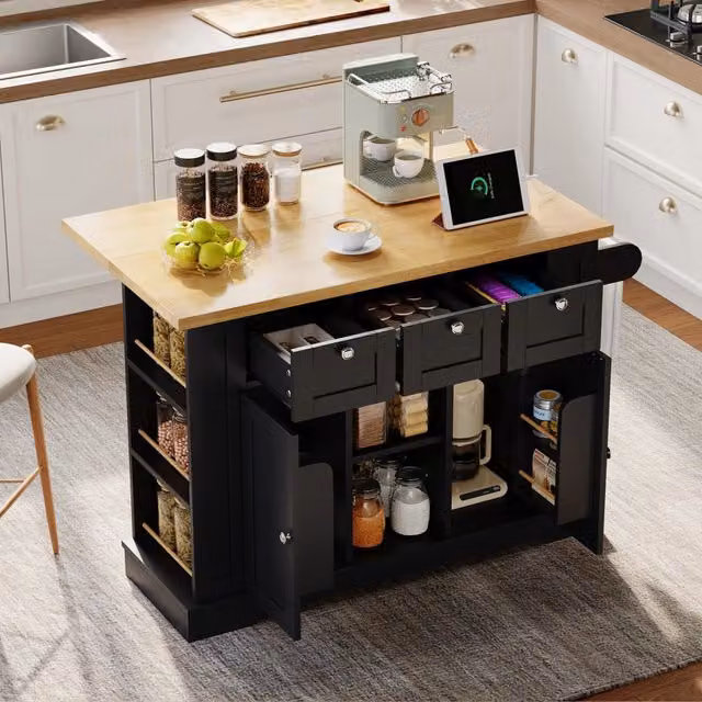 Isola cucina mobile in stile rustico con piano pieghevole, 3 cassetti, prese USB e ruote, marrone e nero, L: 132 cm, P: 70 cm, H: 87 cm