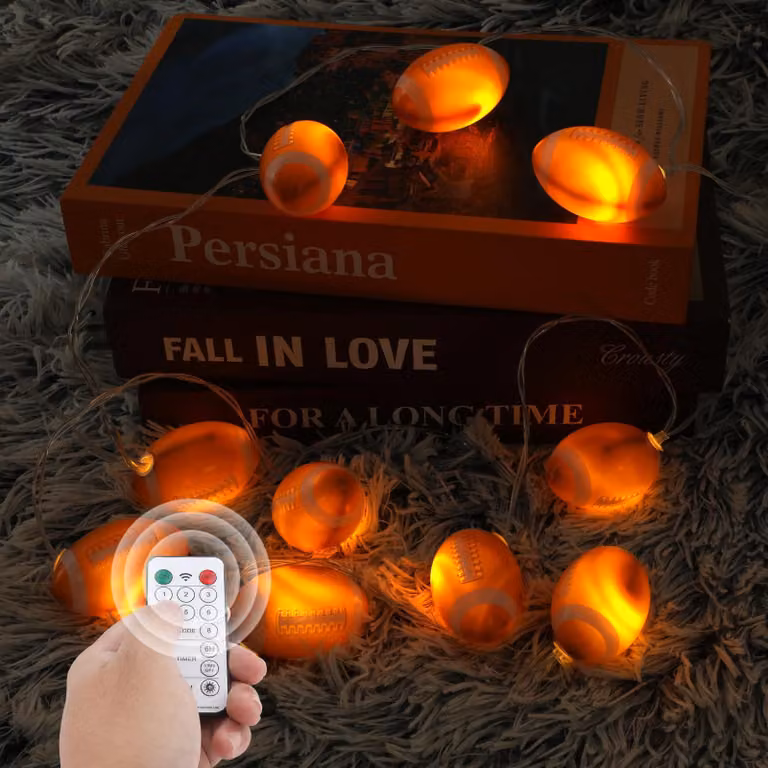 Catena luminosa a forma di pallone da calcio, 2 metri, 10 LED, alimentata a batteria, color arancione