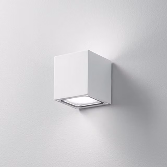 Applique da esterno Perenz Totem con illuminazione LED up/down in metallo e vetro, disponibile in bianco o nero con protezione IP54