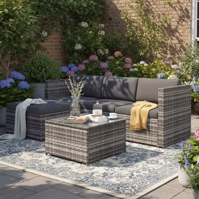 Set divano angolare giardino ¨C Minimal ¨C polyrattan grigio con cuscini e tavolo con piano in vetro