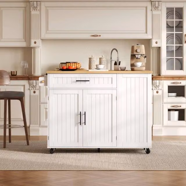 Isola cucina mobile in MDF bianco con piano ribaltabile; cassetto e vano porta rifiuti