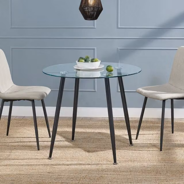 Tavolo rotondo moderno Humppila en.casa con piano in vetro trasparente e gambe in acciaio nero, Diametro: 87 cm, Altezza: 75 cm