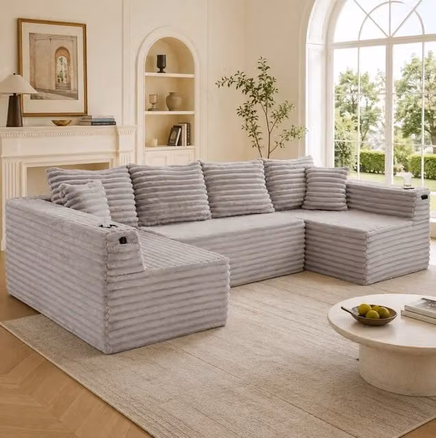 Divano modulare a U REDOM in velluto grigio con cuscini decorativi L: 320 cm, P: 155 cm, H: 88 cm
