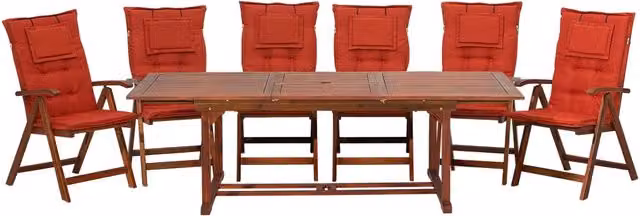 Set da pranzo da giardino BELIANI in legno di acacia con tavolo allungabile e 6 sedie pieghevoli con schienale regolabile e cuscini rossi stile rustico