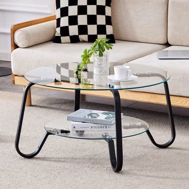Tavolino basso fisso rotondo a due ripiani in vetro con struttura in metallo nero dal design industriale