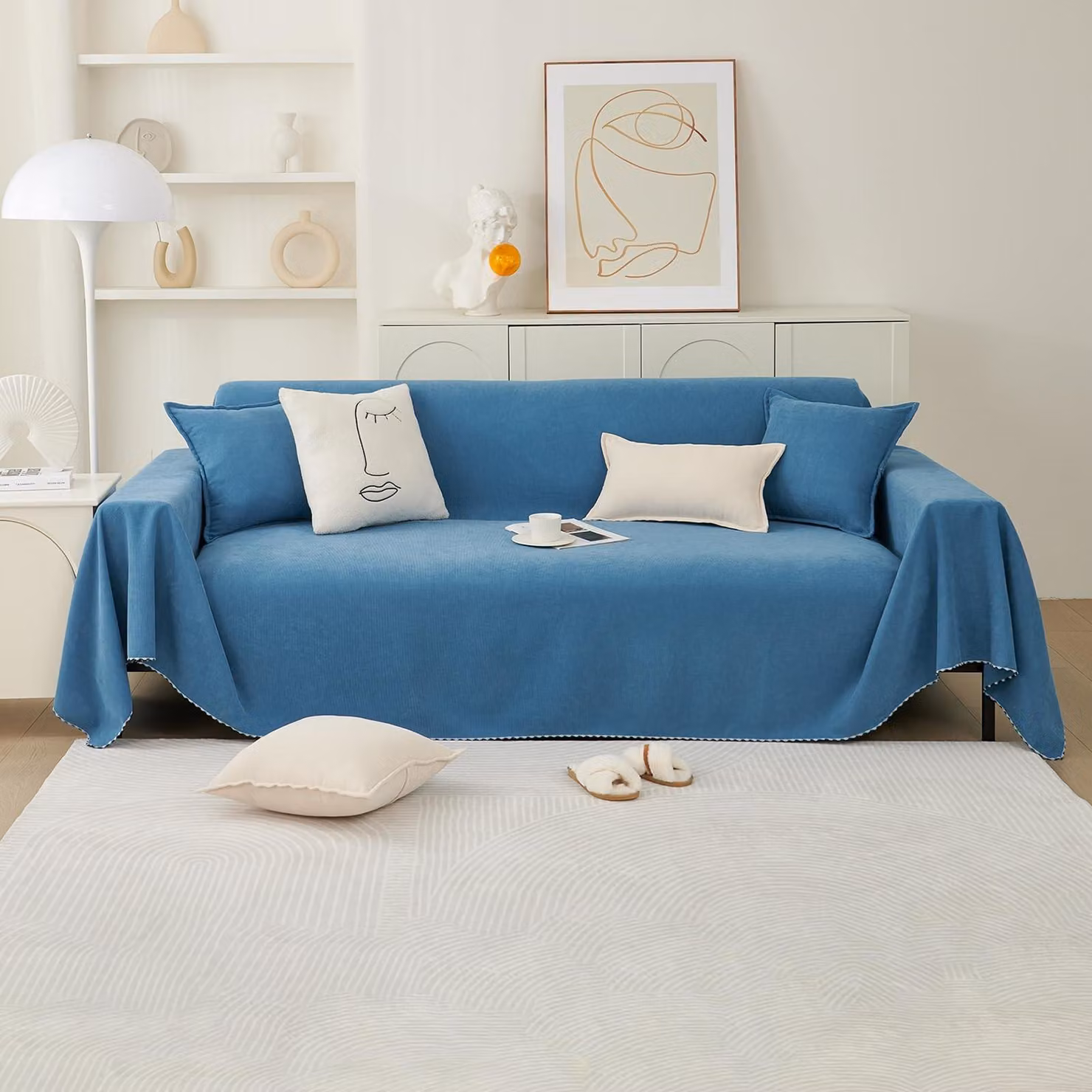 Copertura morbida e universale per divano, con design reversibile