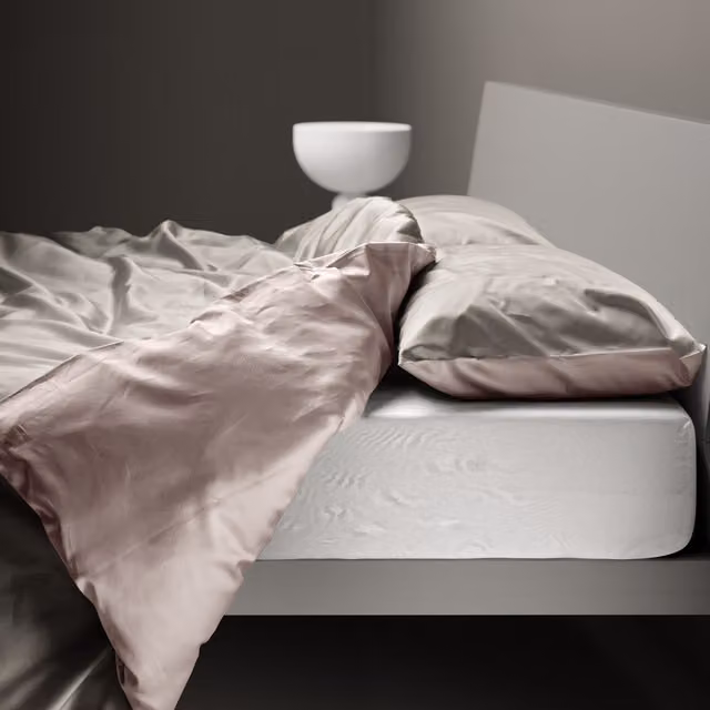 Copripiumino reversibile DaunenStep Oasi Kiss in cotone Mako Satin grigio con chiusura a zip