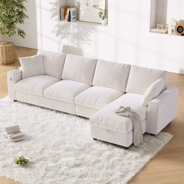 Divano angolare letto MIVRAY in ciniglia beige con chaise longue reversibile, tavolino ribaltabile, vani contenitore e ricarica USB, L/P/H: 280 x 84 x 137 cm