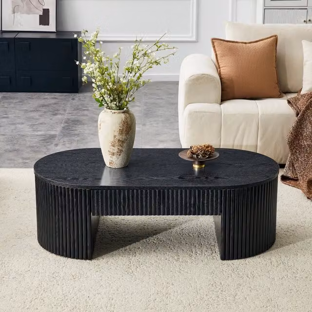 Tavolino ovale nero WISHDOR con cassetto e finitura rigata in MDF, L/P/H: 65 x 30 x 45 cm
