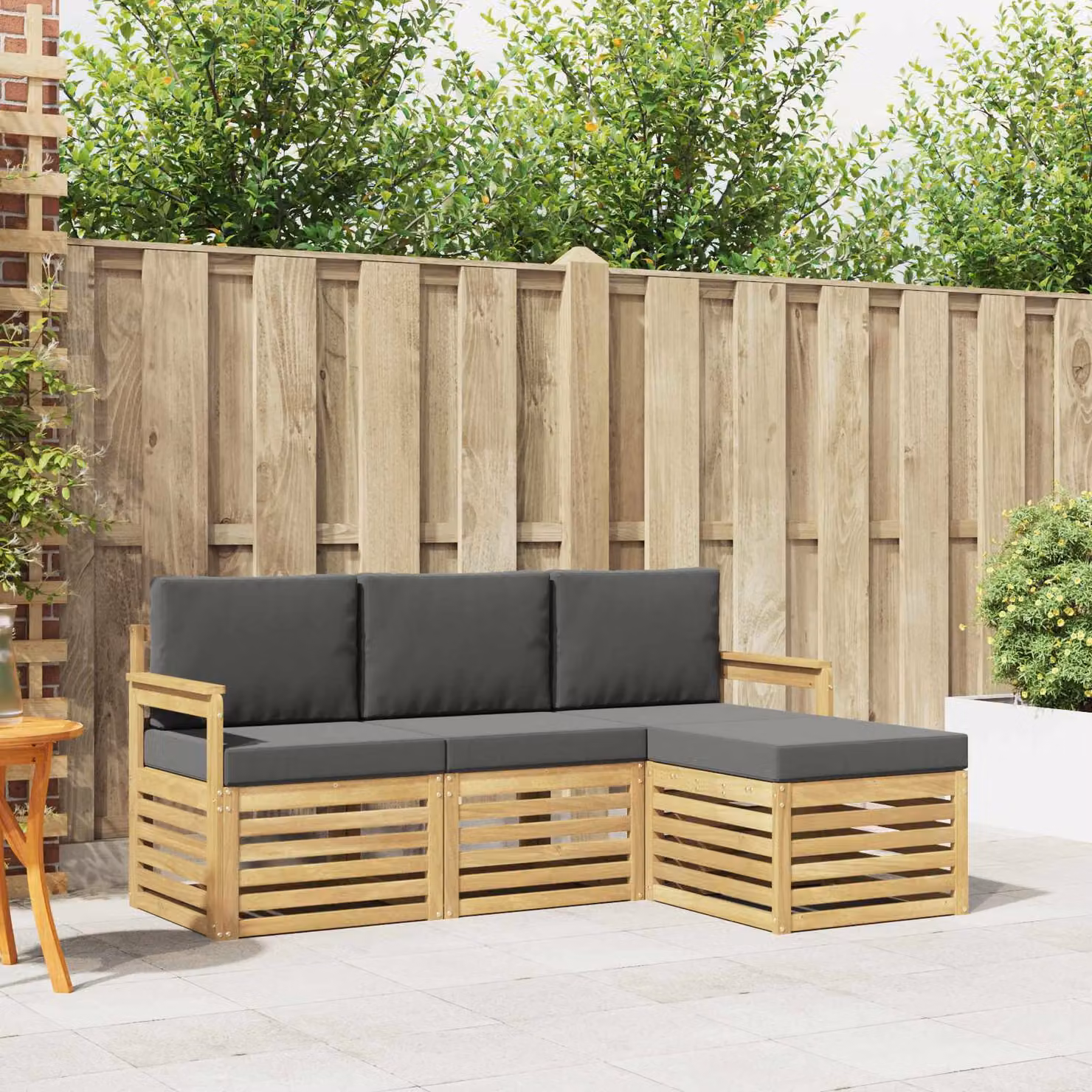 vidaXL Set di divani da esterno a L composto da 4 pezzi in legno di acacia con cuscini Bianco e Antracite