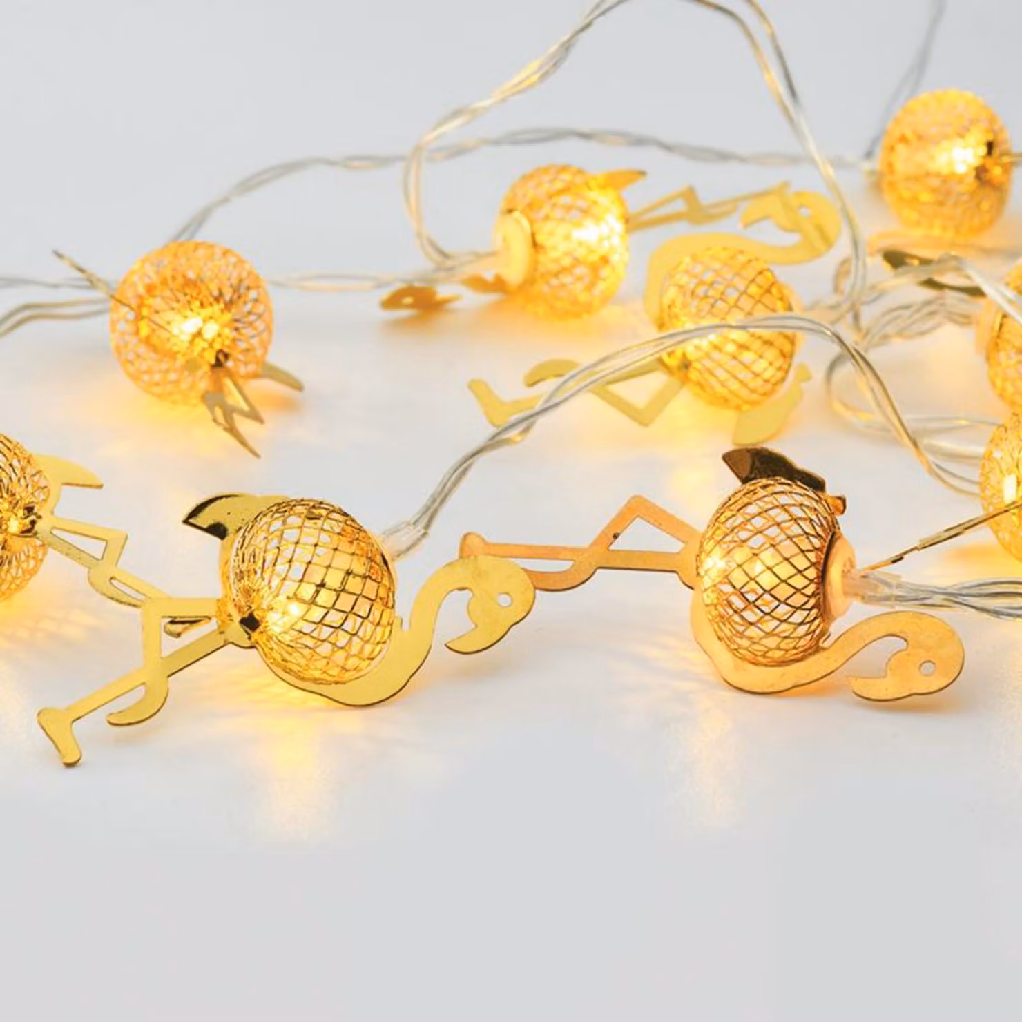 ACA Lighting "catena decorativa in metallo (fenicottero)" 10 LED a batteria (2xAA) bianco caldo IP20 135+30cm cavo trasparente FLAMINGO10WW2A