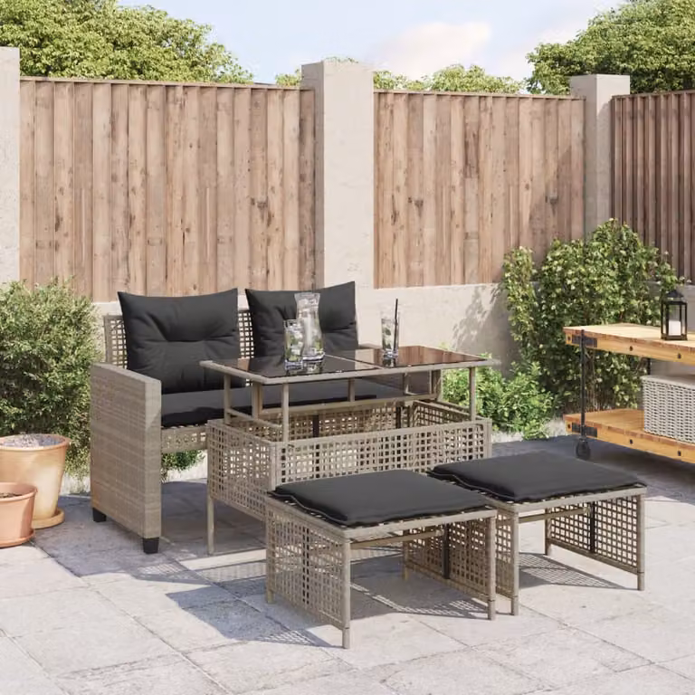 Set da giardino vidaXL composto da divano a L, tavolino da caffè e pouf in polyrattan grigio con cuscini imbottiti e piano in vetro