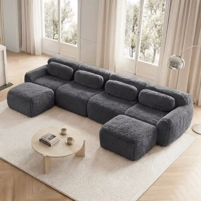 Divano angolare modulare MIVRAY grigio con pouf coordinato, design moderno reversibile a forma di U o L per il tuo soggiorno