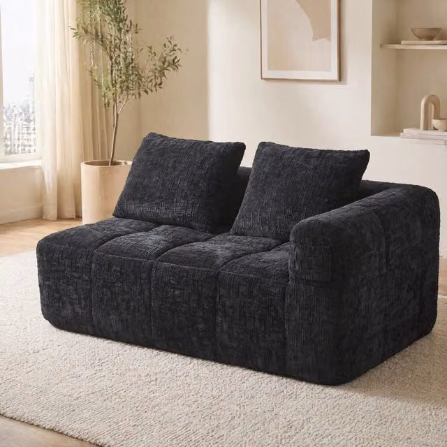 Divano con chaise longue Mivray in velluto nero con cuscini inclusi, design moderno a L per il tuo soggiorno