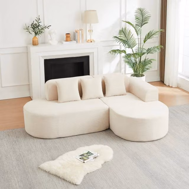 Divano angolare a L Vovees Living da 4 posti con penisola curva in velluto a coste beige, L: 220 cm