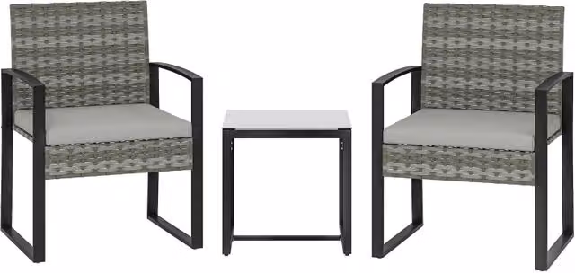 Set salotto da esterno moderno in polyrattan grigio con poltrona lounge, tavolino da caffè in vetro e cuscini inclusi