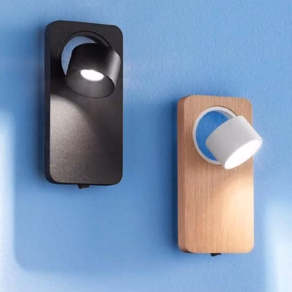 Applique LED Linea Light Beebo in metallo nero con luce calda per camera da letto