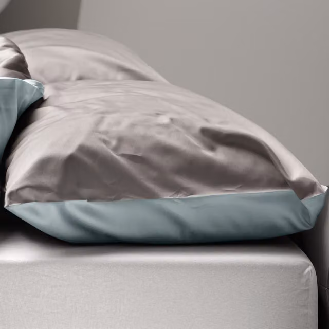 Federa copricuscino reversibile DaunenStep Oasi Kiss in cotone mako satin grigio 50 x 80 cm