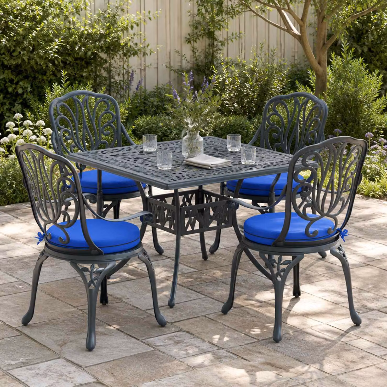 Set di 4 cuscini per sedia rotondi vidaXL in poliestere blu con imbottitura in schiuma e rivestimento lavabile e resistente ai raggi UV