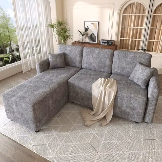 Divano angolare a L con penisola Vovees Living, modello moderno in tessuto grigio con struttura in legno massiccio e cuscini inclusi, L/P/H: 187.5 x 144 x 85.5 cm