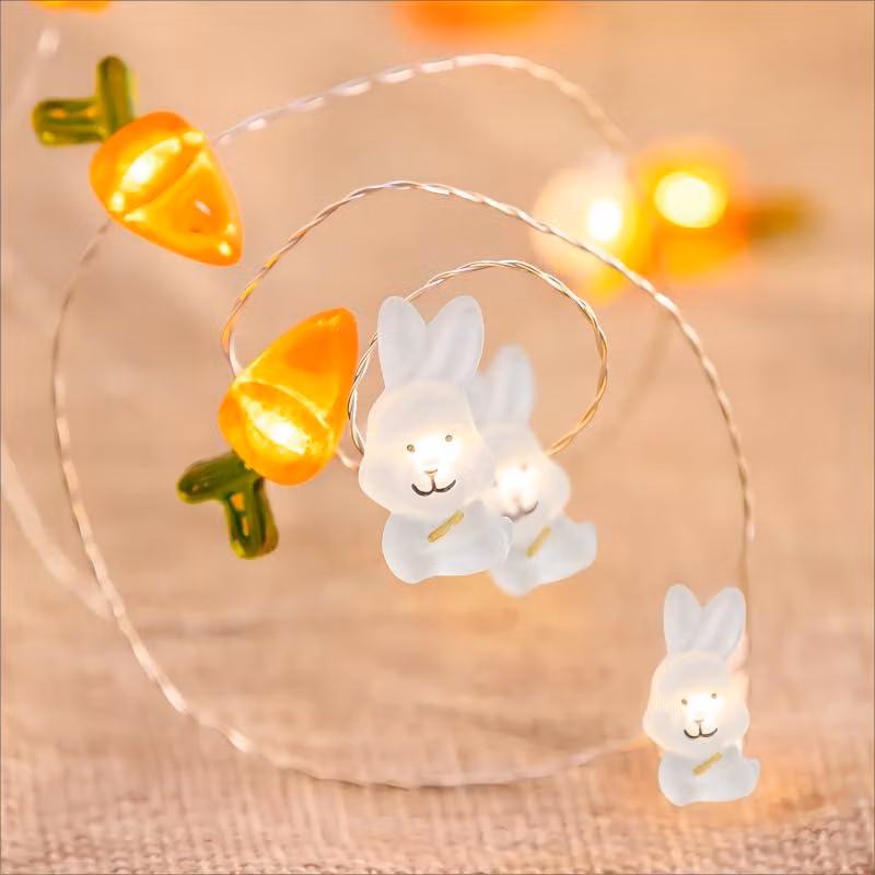 Catena luminosa a tema pasquale, 2 metri, 20 LED, coniglio e carota, alimentata a batteria