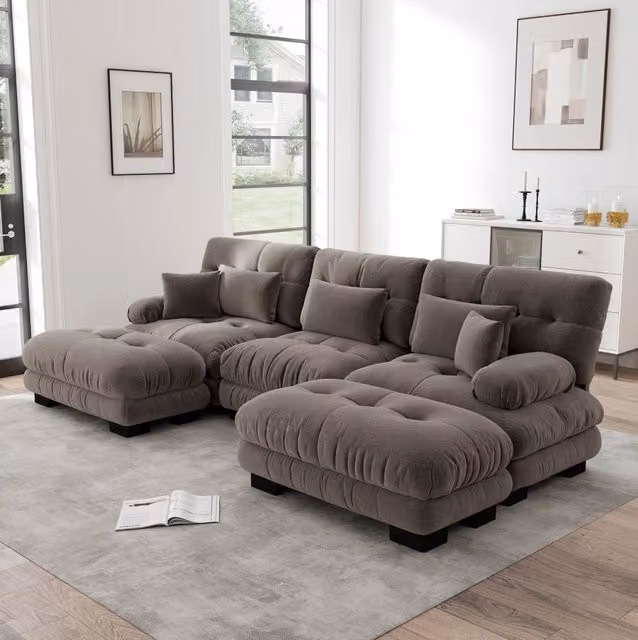 Divano modulare con ottomane mobili in ciniglia marrone; configurabile