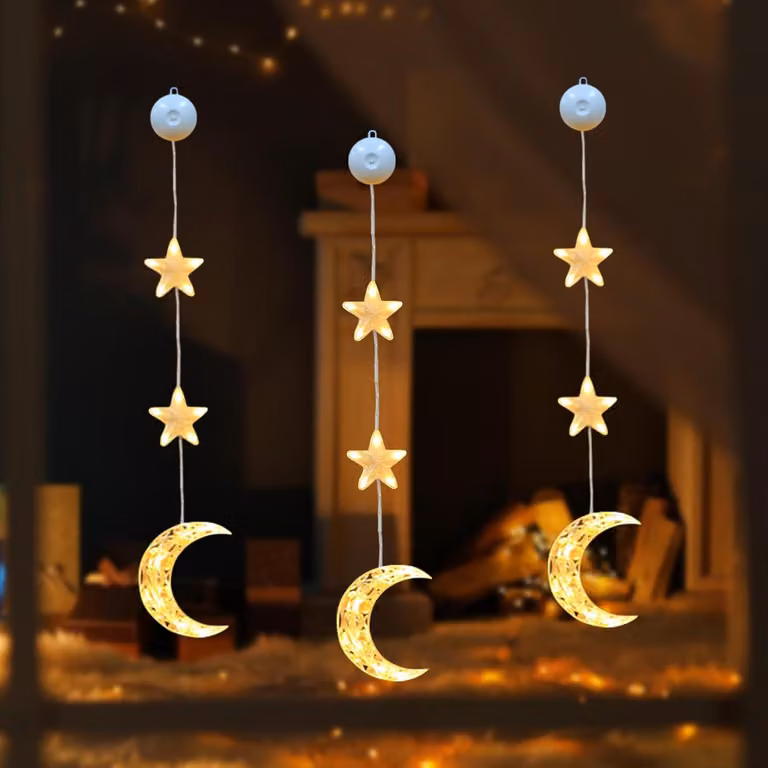 Decorazione luminosa natalizia con stelle a ventosa e luna a LED