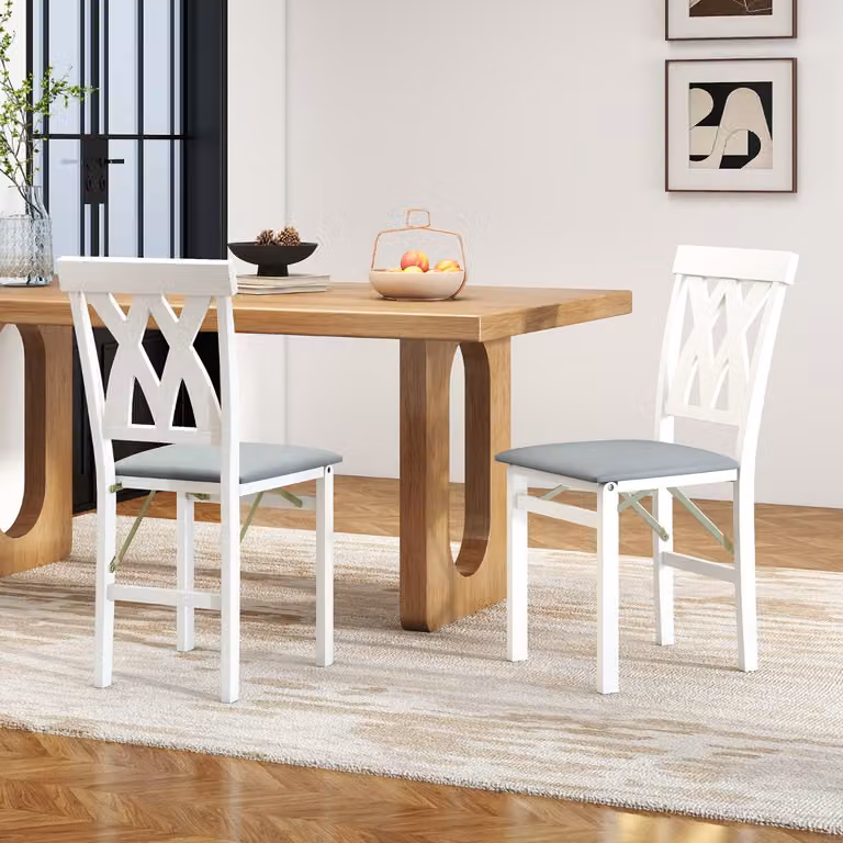 Set di 2 sedie da pranzo pieghevoli Costway in ecopelle bianca con struttura in legno di gomma