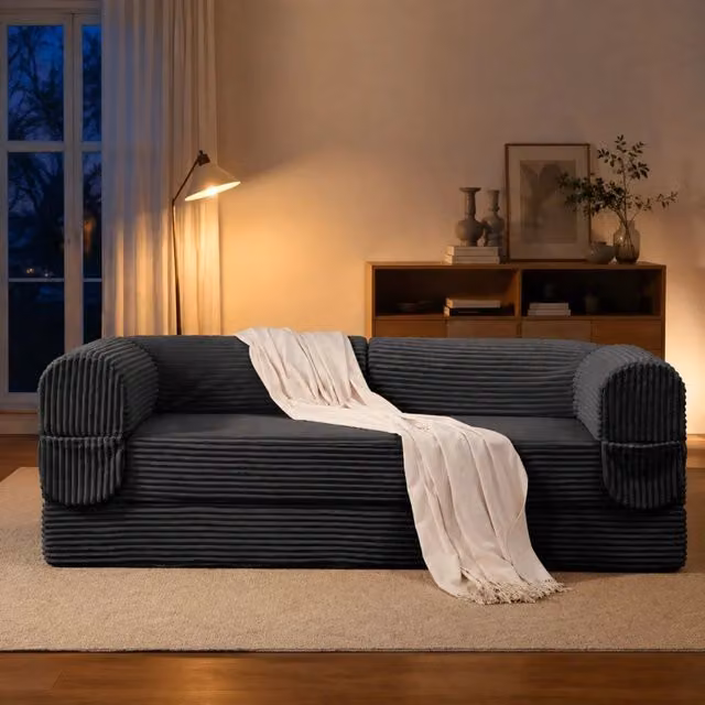 Divano letto Mivray a 2 posti convertibile in letto matrimoniale rivestito in tessuto a coste grigio con braccioli imbottiti
