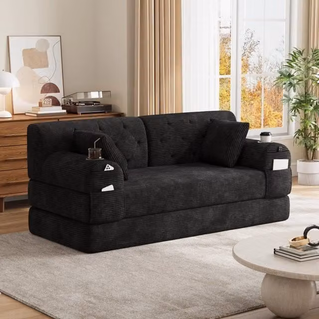 Divano letto 168x80x81 cm con schienale alto; 4 tasche e 2 portabicchieri in velluto a coste nero