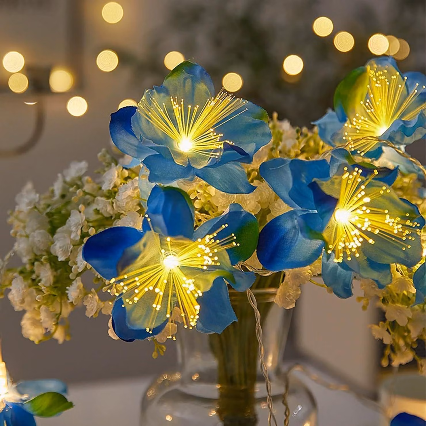 Catena luminosa a forma di fiori, 6 metri, 40 LED, alimentata a batteria, colore blu