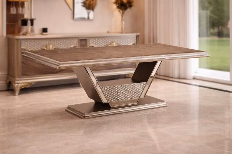 Tavolo da pranzo dal design moderno con finiture in legno e dettagli in metallo dorato