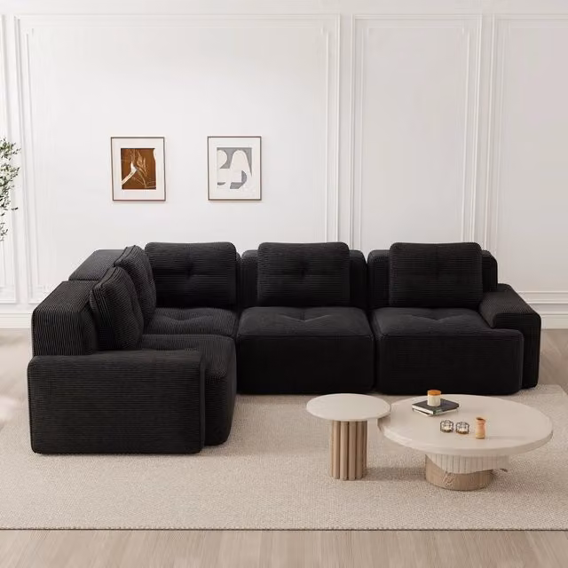 Divano angolare modulare Mivray in velluto a coste nero con seduta profonda 74 cm