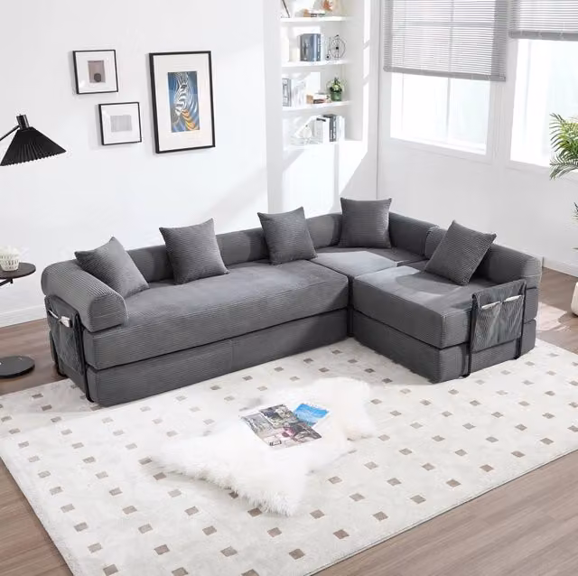 Divano modulare 270x180x64 cm in tessuto grigio scuro con tasca, per piccoli spazi –