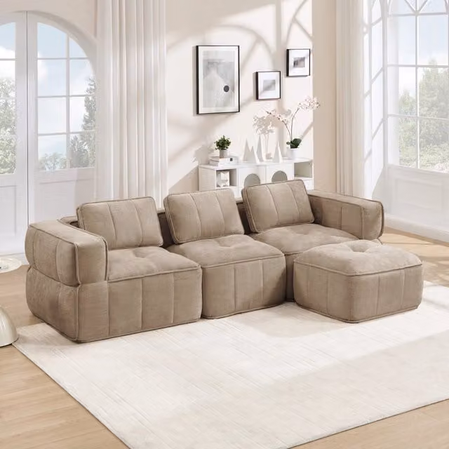 Divano modulare a L moderno con pouf in tessuto color sabbia L/P/H: 271 x 162 x 67 cm